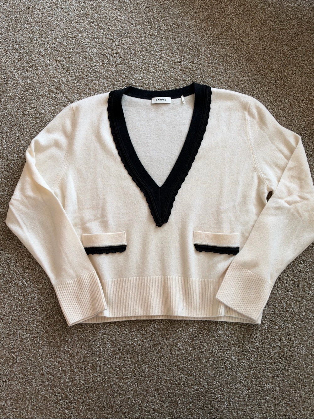 Sandro Cream V-Neck Sweater with Black Trim Accents